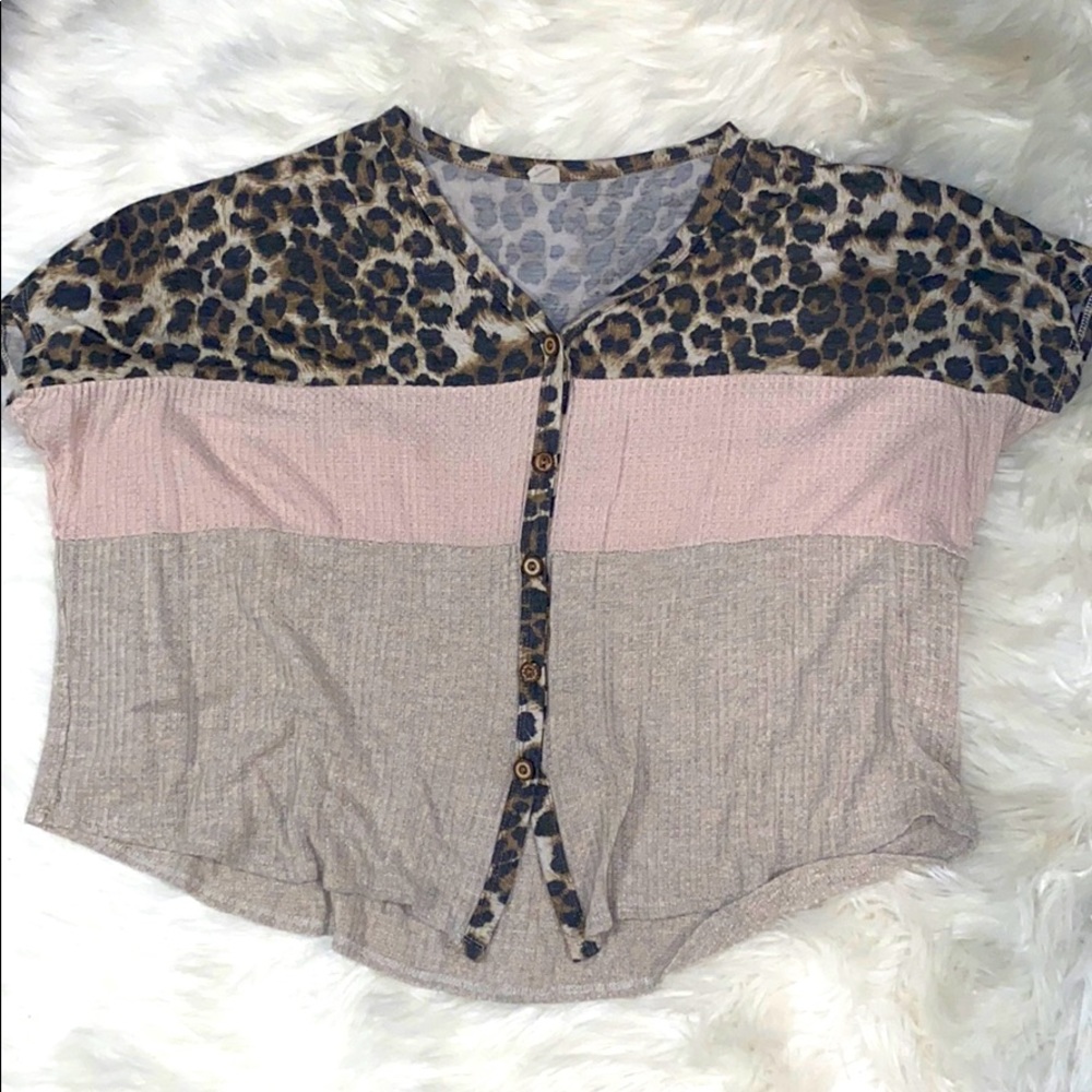 Button up cheeta shirt.